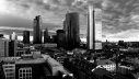 Bankenviertel vor wolkenverhangenem Himmel - Markt- und Regulierungsversagen gelten als Ursachen für die Finanzkrise
