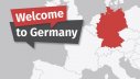 Illustration: Eine Europakarte, auf der Deutschland in rot hervorgehoben ist. Daneben der Schriftzug: Welcome to Germany