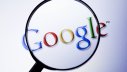 Google unter der Lupe; Quelle: Alija - istockphoto.com
