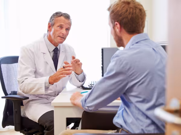 Patient im Arztgespräch